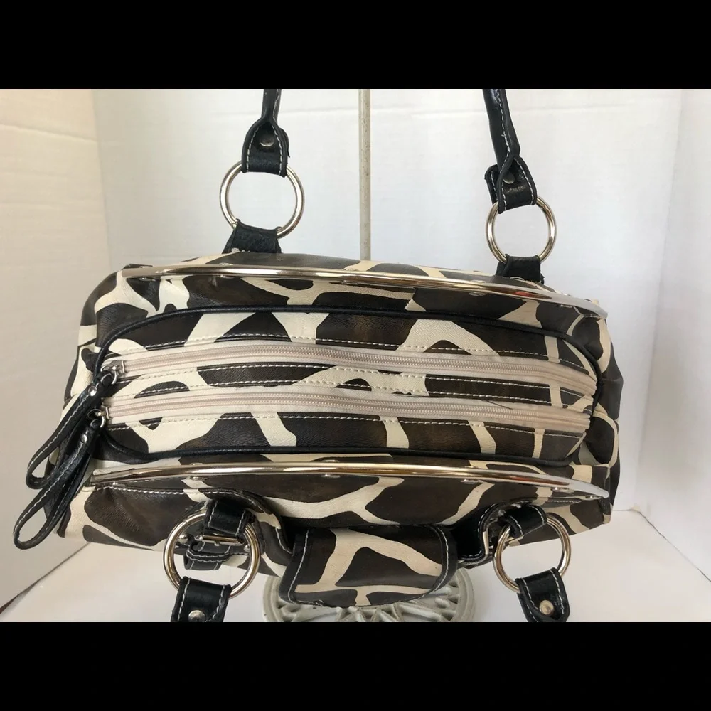 Giraffe print faux leather satchel